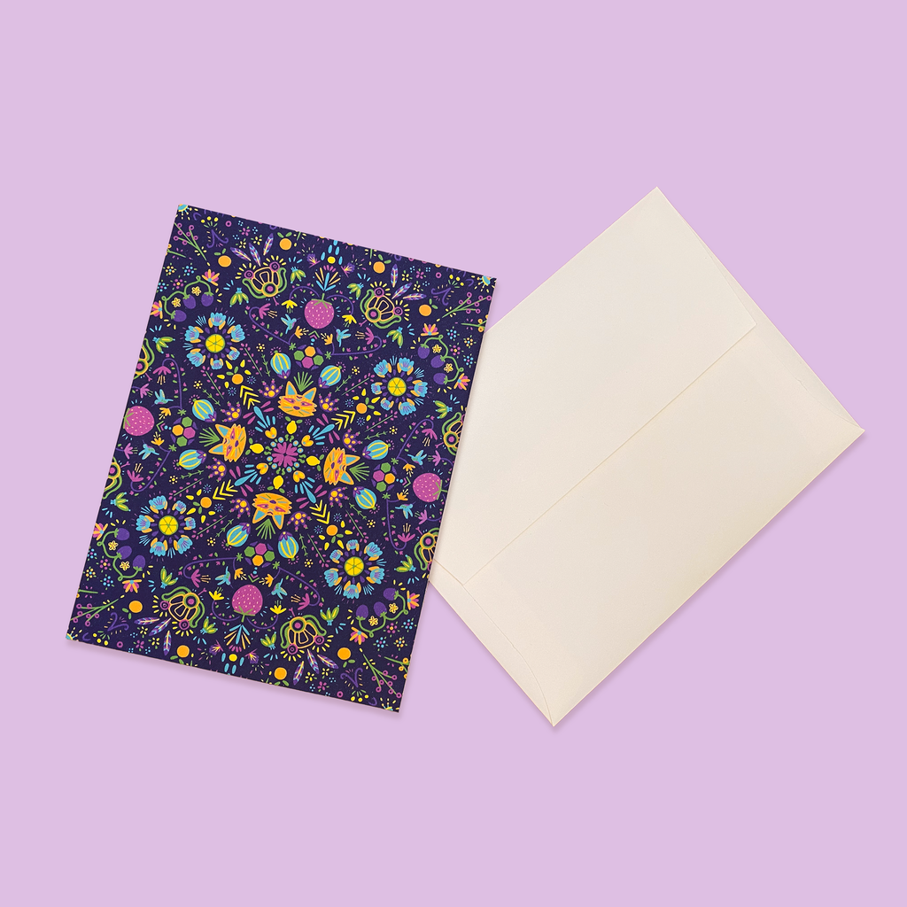 "Tierra Fruta" greeting card next to creme colored envelope.