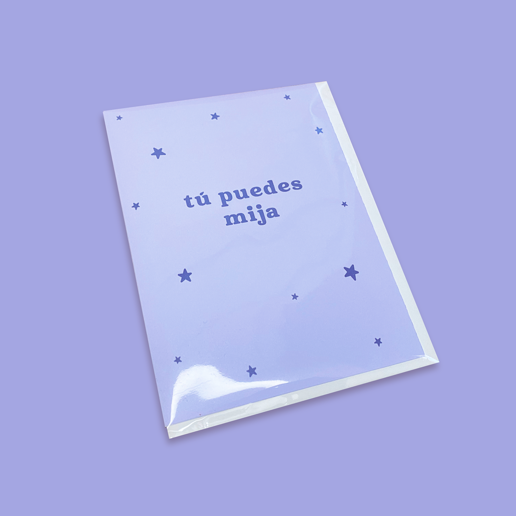"Tu Puedes Mija" greeting card packaged with envelope in a biodegradable cellophane sleeve.