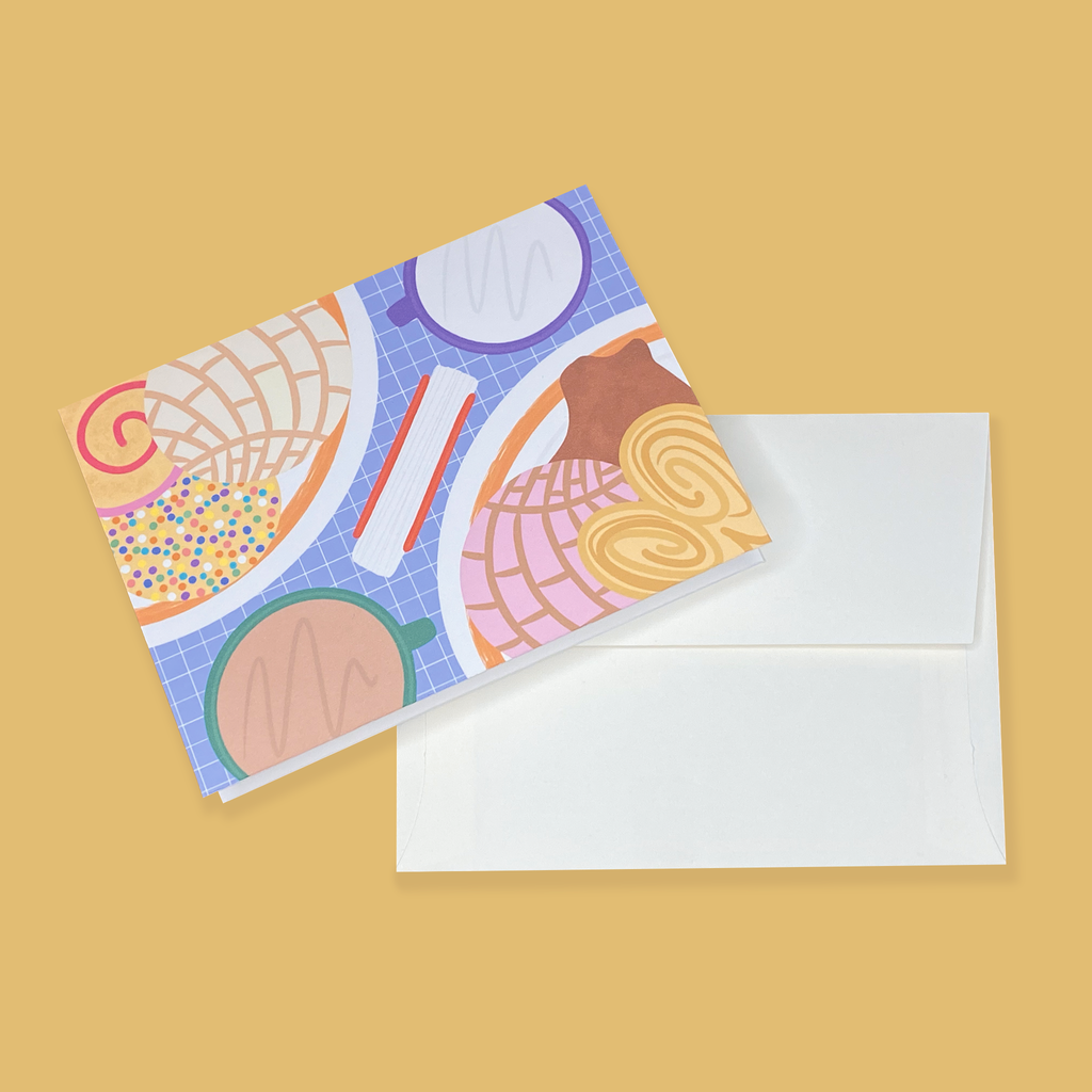 "En La Mesa Pan Dulce" greeting card next to creme colored envelope.