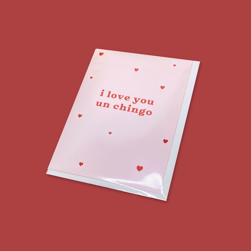 "I Love You Un Chingo" greeting card packaged with envelope in a biodegradable cellophane sleeve.